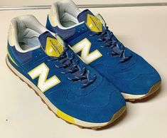 Shoes are in excellent condition, appearing to have been worn minimally. and cared for properly, given overall clean condition and lack of significant wear. Please note shoes are sold without insoles. Sold as pictured. Grand Rapids Mi, New Balance 574, Retro Vintage Style, Comfortable Sneakers, Mens Shoes Boots, Running Shoes Sneakers, Grand Rapids, White Trim, Blue Suede