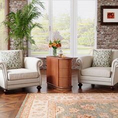 a living room with two chairs and a table