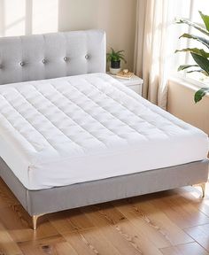 the mattress is made up and ready to be used in the bedroom or as a bed