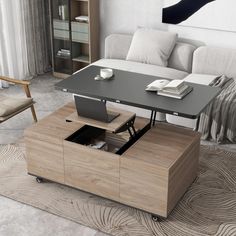 a coffee table with a laptop on it in a living room