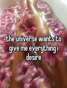 a person laying in a bathtub with flowers on the floor and text that reads, the