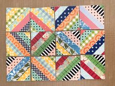 several colorful patchwork squares are arranged together