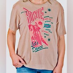 Item/Brand: Band Tee Retail: $24 Size: Available Sizes: 1 Of Each: Small, Medium, Large. Message Me What Size You Would Like At Purchase Or In The Comments Section! Color: Tan Back Ground W/ Neon Pink And Evergreen Bright Colors Measurements: See Photos Features: David Bowie Top Hits List Condition: Brand New Smoke-Free Home :) Shipping: Quick Shipping: Often Same Day, Always Next Day! (Except Sunday When Usps Is Closed) Questions? Leave A Comment Below David Bowie Red Shirt, David Bowie T Shirt Vintage, David Bowie Sweatshirt, Vintage David Bowie Shirt, Bowie Tshirt, Top Hits, China Girl, Soft Shorts, Band Tees