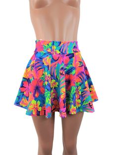 "Tahitian floral Neon print spandex skater skirt 15\" shown on mannequin.High waist skirt can be worn lower or higher most skirts allow you to place the waistline where it suits you on your particular body shape and personal desire! this fun flirty skirt is a full circle design and can be ordered in lengths of 10 inch, 12 inch, 15 inch and 19 inch- if you need a longer length contact me for a quote. Any of my items can be made in any spandex fabric, also any item can be matched if you like a ski Fitted Floral Print Skirt For Vacation, Fitted Skirt For Vacation, Beach Skirted Bottoms With Floral Print, Beach Floral Print Mini Skirt, Floral Print Skirted Bottoms For Beach, Stretch Floral Print Party Skirt, Floral Print Stretch Skirt For Party, Stretch Floral Print Skirt For Party, Tropical Stretch Bottoms With Floral Print