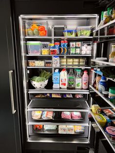 an open refrigerator filled with lots of food