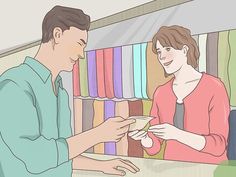 a man handing something to a woman in front of bookshelves