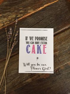 a card that says if we promise you can have extra cake will you be our flower girl?