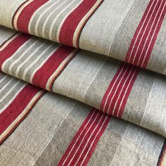 red and grey striped fabric with vertical stripes