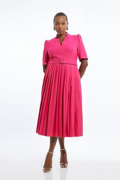 Meet The Everlasting Style Icon - The Forever Dress. A Timeless Addition To Any Well-Considered Wardrobe, This Petite Piece Features A High Notched Collar, V-Neck Front, A Fit And Flare Silhouette, And A Belted Waist. Feel Elevated In Our Plus Size Midi Dress, As The Pleated Skirt Moves With You, And The Structured Shoulders Bring The Drama. Style It With Heels Or Loafers For An Elevated Daytime Look, Perfect For Year-Round Wear. Plus Size Tailored Structured Crepe Forever Pleat Midi Dress High Plus Size Midi Dress, Petite Wedding Guest Dresses, Plus Size Workwear, Pleat Dress, Tall Dresses, Pleated Midi Dress, The Drama, Plus Dresses, Notched Collar