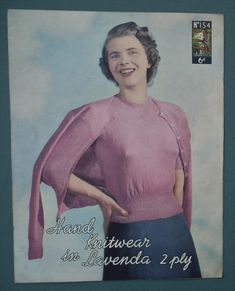 an old photo of a woman wearing a pink sweater