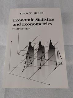 a book on economic statistics and ecomometrics is shown in this image,