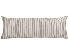 a striped pillow on a white background