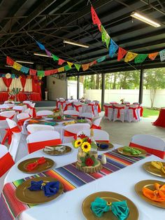 tables set up with colorful napkins and place settings