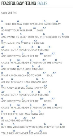 an image of a song with words written in blue and white on the bottom right corner