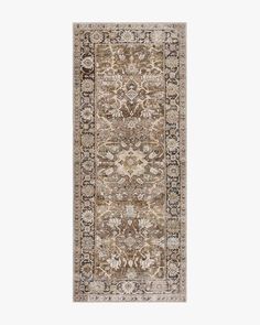 a beige rug with an intricate design on the top and bottom, in front of a white background