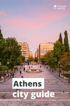 the words athens city guide are in front of an empty plaza