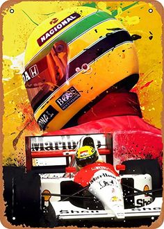 a man driving a race car on top of a yellow and red background with paint splatters