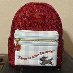 Loungefly Ruby Red slipper backpack Travel Survival Kit, Loungefly Collection, Backpacks Accessories, Dorothy Gale, Sequin Backpack, Mattel Shop