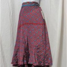 Beach Fashion Red And Teal Floral Print Silk Convertible Skirt And Dress Medium 30 Inch Length This Versatile Beautiful Multi Functional Skirt Can Be Worn In Over 100 Different Ways Giving You A Variety Of Different Outfits In One Garment. Each Skirt Comes With An Instructional Card However The Choices Are Endless And As Far As Your Imagination Can Take You. This Beautiful Convertible Skirt Is A Go-To Favorite When Deciding What To Wear On Any Occasion. Cn 13-0037 Red Asymmetrical Flowy Skirt, Bohemian Red Flared Skirt Bottoms, Bohemian Red Flowy Wrap Skirt, Red Bohemian Wrap Skirt, Bohemian Red Flared Skirt, Red Asymmetrical Lined Maxi Skirt, Red Tiered Maxi Skirt For Festival, Red Asymmetrical Maxi Skirt With Lining, Red Bohemian Wrap Skirt For Summer