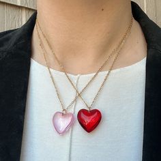 "The Glass Heart Necklace ❤️💗 Featuring a glass puffy heart pendant (choose color) and an 18k gold filled oval link chain (18\") and if you need a custom length, DM me!  Unisex 🖤 Made with love 🫶 A 2\" extender can be added to each necklace so that you can adjust it! 😊" Red Heart Jewelry, Glass Heart Necklace, Puffed Heart Necklace, Red Heart-shaped Chain Necklace, Red Adjustable Heart-shaped Necklace, Unique Red Heart-shaped Necklace, Vintage Red Heart-shaped Necklace, Puffy Heart Necklace, Puffed Heart