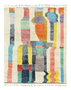 a multicolored rug with bottles on the bottom and fringes hanging from it