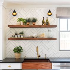 the kitchen is clean and ready to be used as a place for cooking or drinking