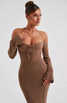 The stunning crochet Samariah dress is sure to be your new fave maxi, made in our soft crochet knit with a slight stretch that moulds to your figure. With long sleeves, off the shoulder styling and and a tie detail bust, wear yours with heeled mules and sleek waves. 



Colour: Chocolate.

Premium crochet knit.

Off the shoulder styling.

Tie detail.

Long flared sleeves.

Moulds to body figure.

Maxi length.

Model is an XS and is wearing an XS.

 Size: XS, S, M, L, XL, XXL Sleek Waves, Homecoming Dresses Corset, Sale Clothes, Soft Crochet, Maxi Dress Sale, Dresses Cocktail, Sparkle Dress, Backless Maxi Dresses, Flattering Dresses