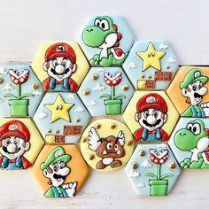 the cookies are decorated with mario and luigi's characters on them, along with other decorations