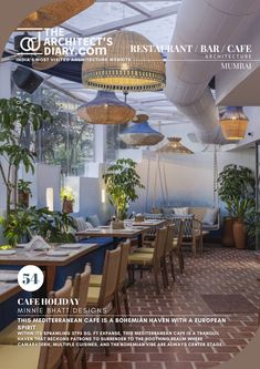 an image of a restaurant setting with plants on the tables and hanging lights in the ceiling