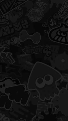 black and white wallpaper with many different stickers on the back of each one