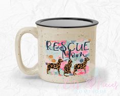 a coffee mug with the words rescue mom and two cheetah silhouettes on it