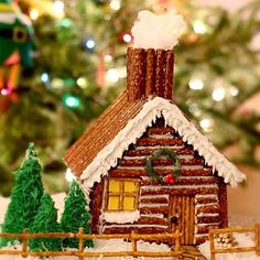 a gingerbread house is decorated for christmas