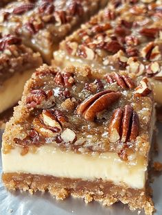 several pieces of pecan cheesecake sitting on top of a piece of wax paper