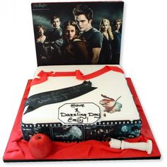 a birthday cake with an image of the twilight saga on it and some movie characters