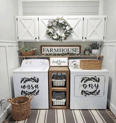 a white washer and dryer sitting next to each other in a laundry room