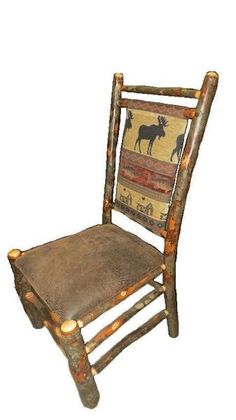 a wooden chair with a brown leather seat and back cover on it's side