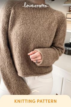 a woman wearing a brown sweater and white pants with the words knitting pattern on it