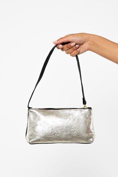 The Embellished Zip Pochette is a pouch shoulder bag with a zipper closure. This artisanal product is made of genuine leather. All scars are characteristics of the skin and not imperfections. We hope you enjoy this unique handmade object.- Brass zipper- Genuine Cowhide- Handmade in the U.S.A. | Embellished Leather Zip Pochette in Silver/Black Snake Black, Gold Snake, Gold Black, The Skin, Genuine Leather, Im Not Perfect, Pouch, Brass, Shoulder Bag