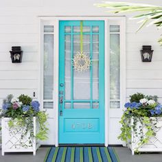 the cover of coastal living's 10 decorating ideas, featuring blue doors and potted plants