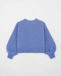 a blue sweater on a white background