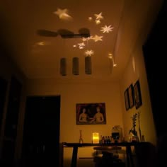 the ceiling is decorated with stars and lights