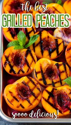 grilled peaches in a metal pan with the words, the best grilled peaches good delicious