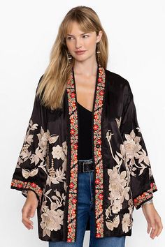 Crafted from a lightweight and flowing fabric, the Carolina Kimono offers two fully reversible and distinctive patterns to choose from. Featuring a snap-front closure and traditional kimono sleeves, this layering piece is finished with intricate placement embroidery and delicate floral trim. Wear it over a bold blouse and pair with a fitted skirt for an unconventional evening look. Johnny Was Women's Carolina Kimono in Black, Size XS, Floral Kimono Online, Placement Embroidery, Kimono Outerwear, Felt Cowboy Hats, Flowing Fabric, Traditional Kimono, Concert Fashion, Boho Chic Outfits, Weekly Outfits