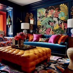 a living room filled with lots of colorful furniture