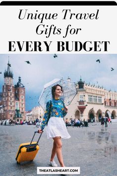 a woman with an umbrella and suitcase in front of a castle, text reads unique travel gifts for every budget