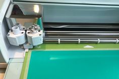 an image of a machine that is cutting paper