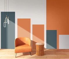 an orange chair sitting next to a wooden stump in front of a wall with different colored panels