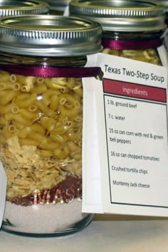 three jars filled with macaroni and cheese