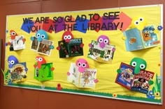 a bulletin board that has various books on it with the words we are glad to see you at the library