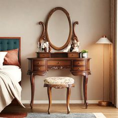 a bedroom scene with focus on the dressing table and mirror, along with a bed